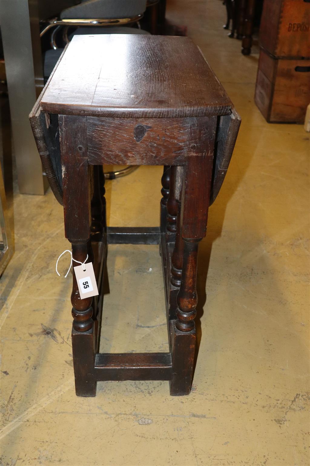 A small oak gateleg table, width 65cm, depth 34cm, height 66cm